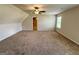 This is a spacious bedroom with neutral colored walls and a ceiling fan at 116 Standford Dr, Mcdonough, GA 30252