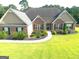 Charming brick home with well-manicured lawn and landscaping for great curb appeal at 116 Standford Dr, Mcdonough, GA 30252