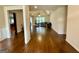 A spacious living room with hardwood floors and natural light at 116 Standford Dr, Mcdonough, GA 30252