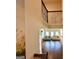 Open-concept living room featuring hardwood floors and iron rod railing at 116 Standford Dr, Mcdonough, GA 30252