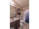 Well-lit bathroom with vanity, and shower at 125 Seawright Dr, Fayetteville, GA 30215
