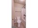 Bathroom with a toilet and a shower/tub combination with tiled walls and a shower head at 125 Seawright Dr, Fayetteville, GA 30215