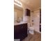 Bathroom with vanity, toilet, and shower/tub with curtain at 125 Seawright Dr, Fayetteville, GA 30215