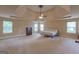 Bedroom with trey ceiling, ceiling fan, and windows at 125 Seawright Dr, Fayetteville, GA 30215