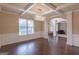 Bright dining room with coffered ceilings, hardwood floors, and natural light at 125 Seawright Dr, Fayetteville, GA 30215