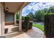 A covered front porch with stone accents, manicured landscaping, and elegant outdoor lighting at 125 Seawright Dr, Fayetteville, GA 30215