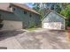 The spacious, attached two-car garage offers ample parking and storage space with an additional two-car garage in the back at 125 Seawright Dr, Fayetteville, GA 30215