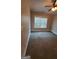 Bedroom with a window and carpeted floor at 90 Alcovy Reserve Way, Covington, GA 30014