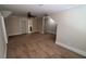 Neutral bedroom featuring plush carpet, ceiling fan, and doorway to bathroom at 90 Alcovy Reserve Way, Covington, GA 30014