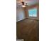 Bedroom with a window and carpeted floors at 90 Alcovy Reserve Way, Covington, GA 30014