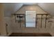 Walk-in closet features a window and installed metal shelving for maximum storage at 90 Alcovy Reserve Way, Covington, GA 30014