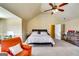 Spacious main bedroom with vaulted ceilings, ceiling fan, and sitting area at 697 Chapman, Jonesboro, GA 30238