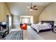 Large main bedroom showcasing high ceilings and a cozy sitting area with plush furnishings at 697 Chapman, Jonesboro, GA 30238