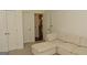 Spacious bonus room with carpet flooring and an open doorway at 6660 Canyon Cv, Cumming, GA 30028