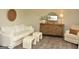 Comfortable living room showcasing an arrangement of seating and a rustic console table at 6660 Canyon Cv, Cumming, GA 30028