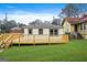 Well-maintained backyard with a spacious wooden deck, ideal for entertaining or relaxing outdoors at 1 Lamar Ave Sw, Atlanta, GA 30310