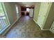Open concept kitchen and dining area with access to a back deck at 194 Bay Court Dr, Stockbridge, GA 30281