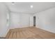 Spacious bedroom with plush carpeting, bright white walls, a window and two white doors at 1184 Bluecoat Cir # 84, Hampton, GA 30228