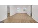 Large bedroom featuring plush carpet, two windows, and light-colored walls at 1184 Bluecoat Cir # 84, Hampton, GA 30228