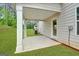 This home features a covered outdoor patio, perfect for relaxing or entertaining guests at 1184 Bluecoat Cir # 84, Hampton, GA 30228