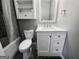 This bathroom features white cabinets and sink at 206 Birchin Dr, Woodstock, GA 30188