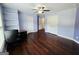 This bedroom features hardwood floors and closet space at 206 Birchin Dr, Woodstock, GA 30188
