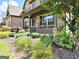 Inviting front porch with decorative railings, lush plantings, and a cozy atmosphere at 206 Birchin Dr, Woodstock, GA 30188