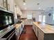 Elegant kitchen with granite countertops, stainless steel appliances, and plenty of cabinet space at 206 Birchin Dr, Woodstock, GA 30188