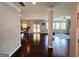 Open concept living room with hardwood floors, lots of windows, and ample space at 206 Birchin Dr, Woodstock, GA 30188