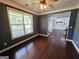 Living room with hardwood floors, natural light, and a ceiling fan at 206 Birchin Dr, Woodstock, GA 30188