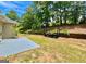 Well-maintained backyard with patio, lawn, and planting station at 121 Pinnacle Ln, Mcdonough, GA 30253