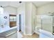Bright bathroom with a shower, vanity, and a neutral color at 121 Pinnacle Ln, Mcdonough, GA 30253