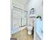 Bathroom with shower, toilet, vanity, with white cabinet at 121 Pinnacle Ln, Mcdonough, GA 30253