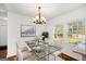 Bright dining room with table setting at 1675 Brewer Sw Blvd, Atlanta, GA 30310