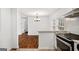 Eat in kitchen with modern stainless steel appliances and granite countertop at 1675 Brewer Sw Blvd, Atlanta, GA 30310