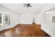 Spacious living room featuring an open layout and bay windows that let in lots of natural light at 1675 Brewer Sw Blvd, Atlanta, GA 30310