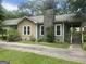 Charming two-story home with stone chimney, offering a cozy and inviting appeal at 212 Rockmart Rd, Villa Rica, GA 30180