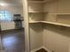 Bright kitchen featuring stainless steel appliances and a view from adjacent pantry at 212 Rockmart Rd, Villa Rica, GA 30180