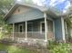 Charming two-story house featuring a cozy porch with stylish accents at 212 Rockmart Rd, Villa Rica, GA 30180