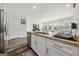 Open kitchen with stainless steel appliances and granite countertops at 8717 Lakeview Commons, Jonesboro, GA 30238