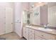 A spacious bathroom with double vanity sinks, a large mirror, and neutral decor at 226 Euharlee Five Forks Rd, Kingston, GA 30145
