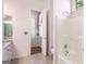 An en-suite bathroom features a shower-tub combo, granite vanity, and adjacent water closet at 226 Euharlee Five Forks Rd, Kingston, GA 30145