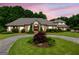 Stately brick home with manicured landscaping and a circular driveway at 226 Euharlee Five Forks Rd, Kingston, GA 30145