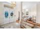 Bright foyer with marble floors and stained-glass accent doors at 226 Euharlee Five Forks Rd, Kingston, GA 30145