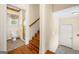 Hallway view showcasing access to the bathroom, staircase, and a convenient closet at 226 Euharlee Five Forks Rd, Kingston, GA 30145