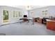 Spacious home office with abundant natural light from many windows and outdoor access at 226 Euharlee Five Forks Rd, Kingston, GA 30145