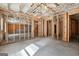 Unfinished basement with stud walls and concrete floors, ready for customization at 257 Orwell Drive Lot 48 # 48, Social Circle, GA 30025