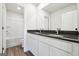 Bathroom featuring double sinks, granite countertops, and a shower-tub combo at 257 Orwell Drive Lot 48 # 48, Social Circle, GA 30025