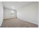 A cozy bedroom featuring neutral carpeting and a bright window at 257 Orwell Drive Lot 48 # 48, Social Circle, GA 30025