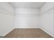 A walk-in closet offering plenty of storage with multiple levels of shelving at 257 Orwell Drive Lot 48 # 48, Social Circle, GA 30025